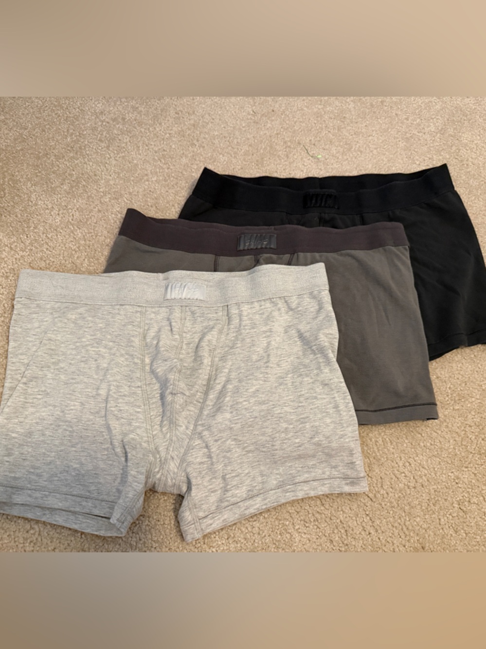 SKIMS Men's Boxer Briefs Trio in Light Gray, Charcoal, and Black